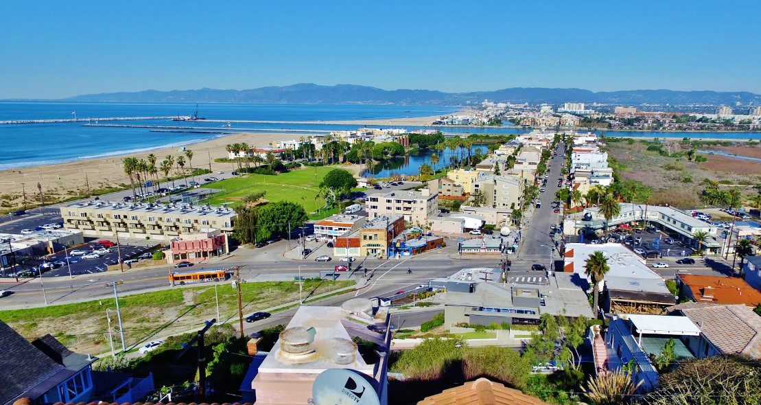 A view of the beach and water from above.