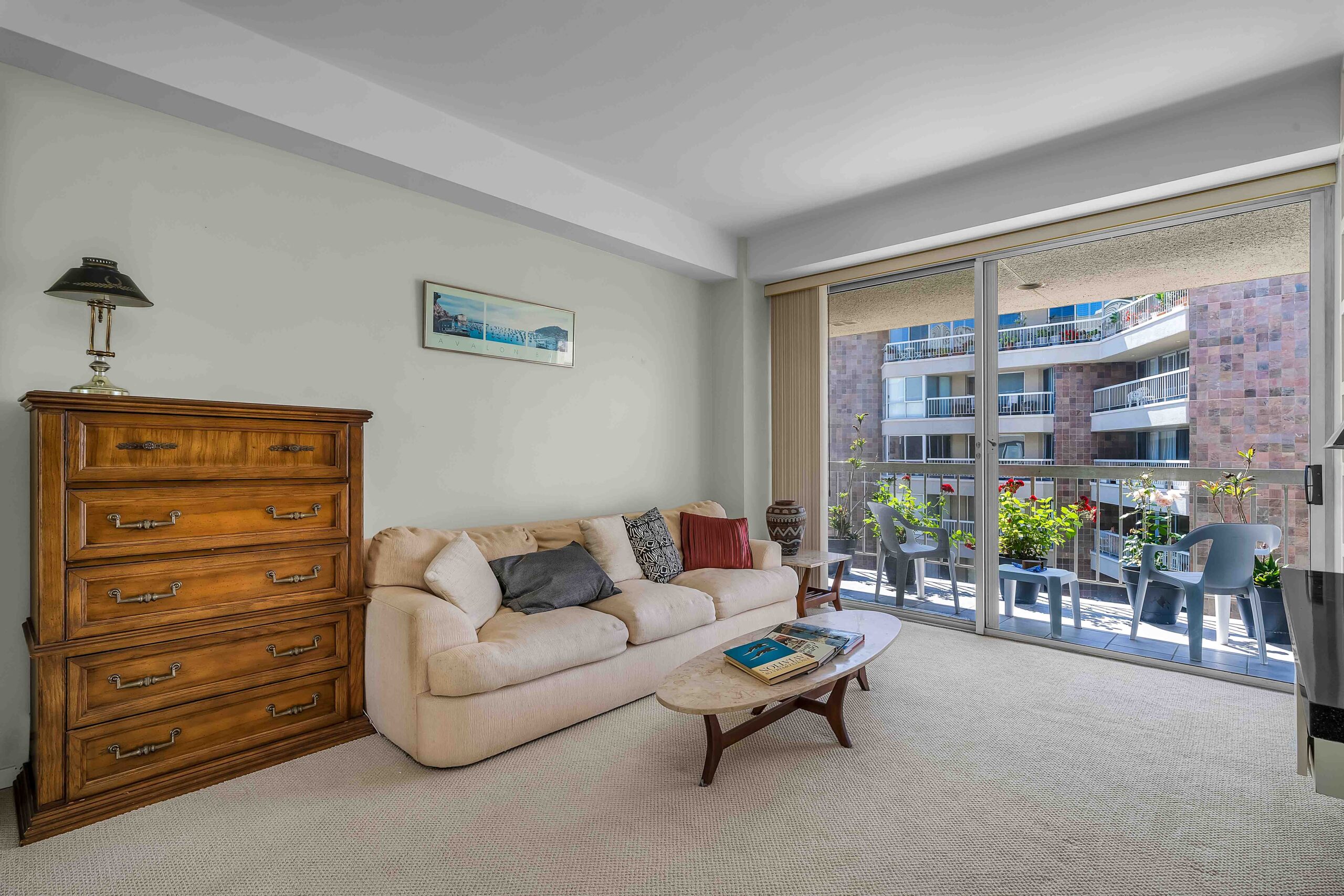 A living room with a couch and a table