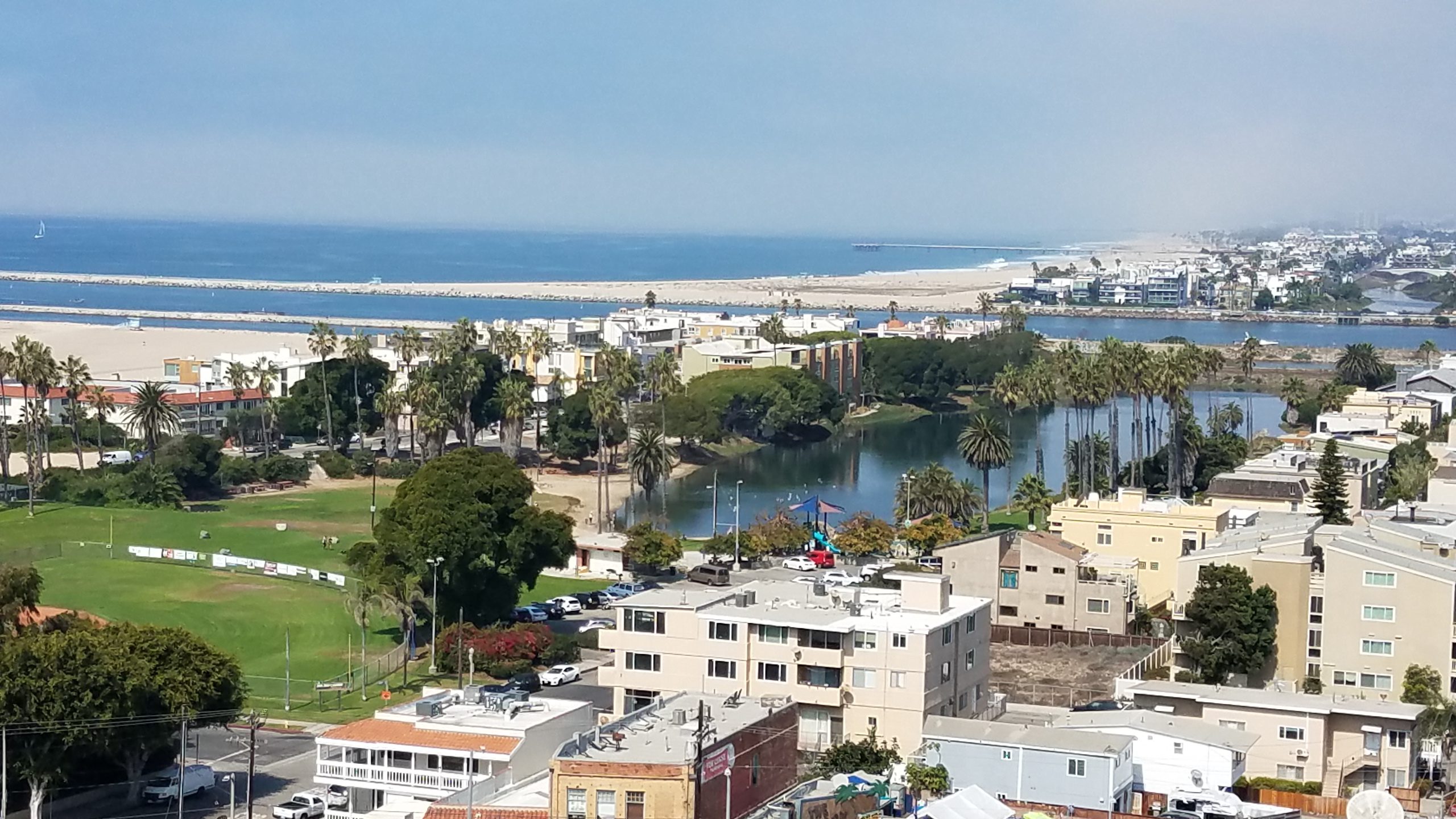 A view of the ocean and beach from above.