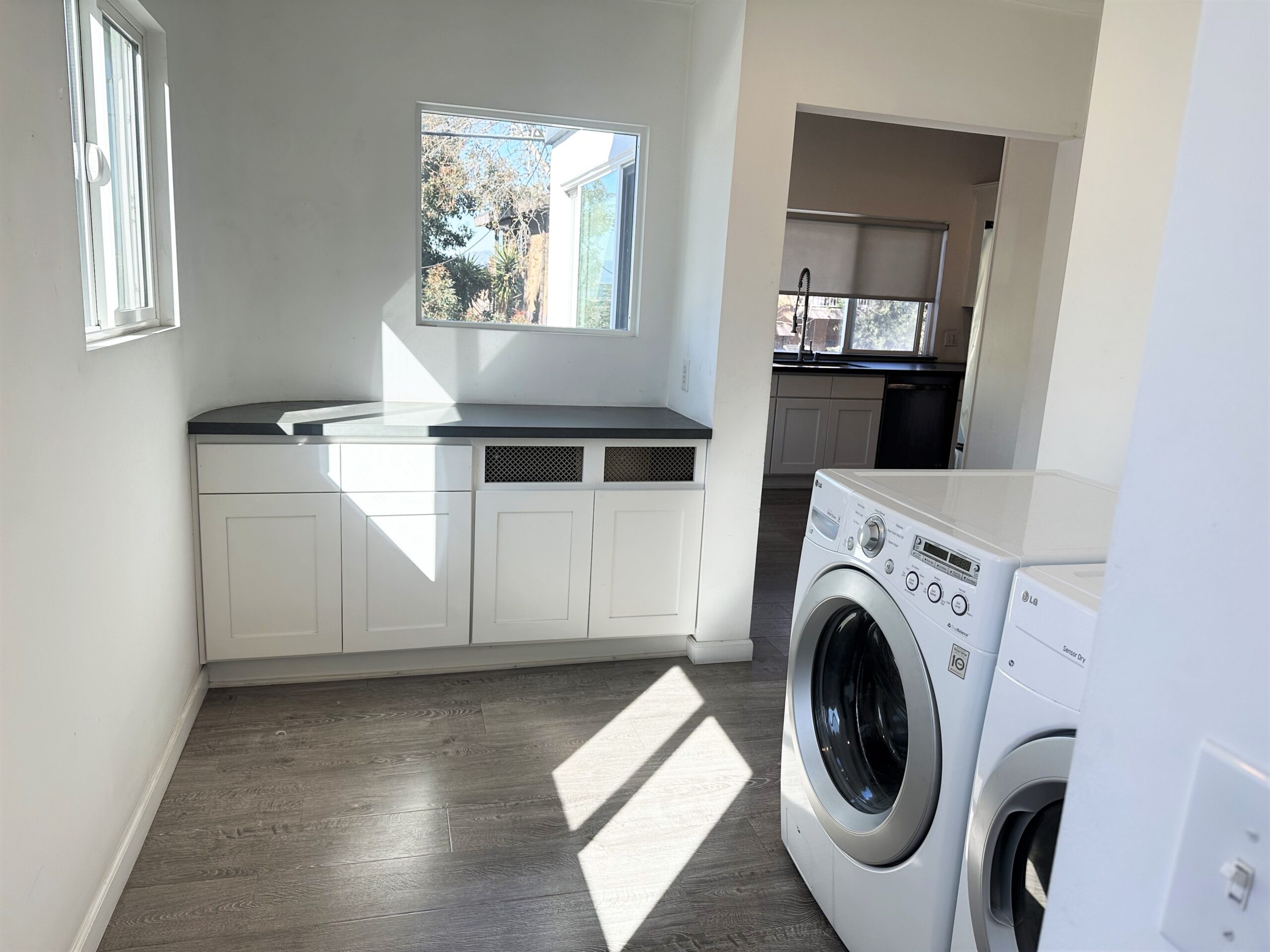 A white washer and dryer in a room.